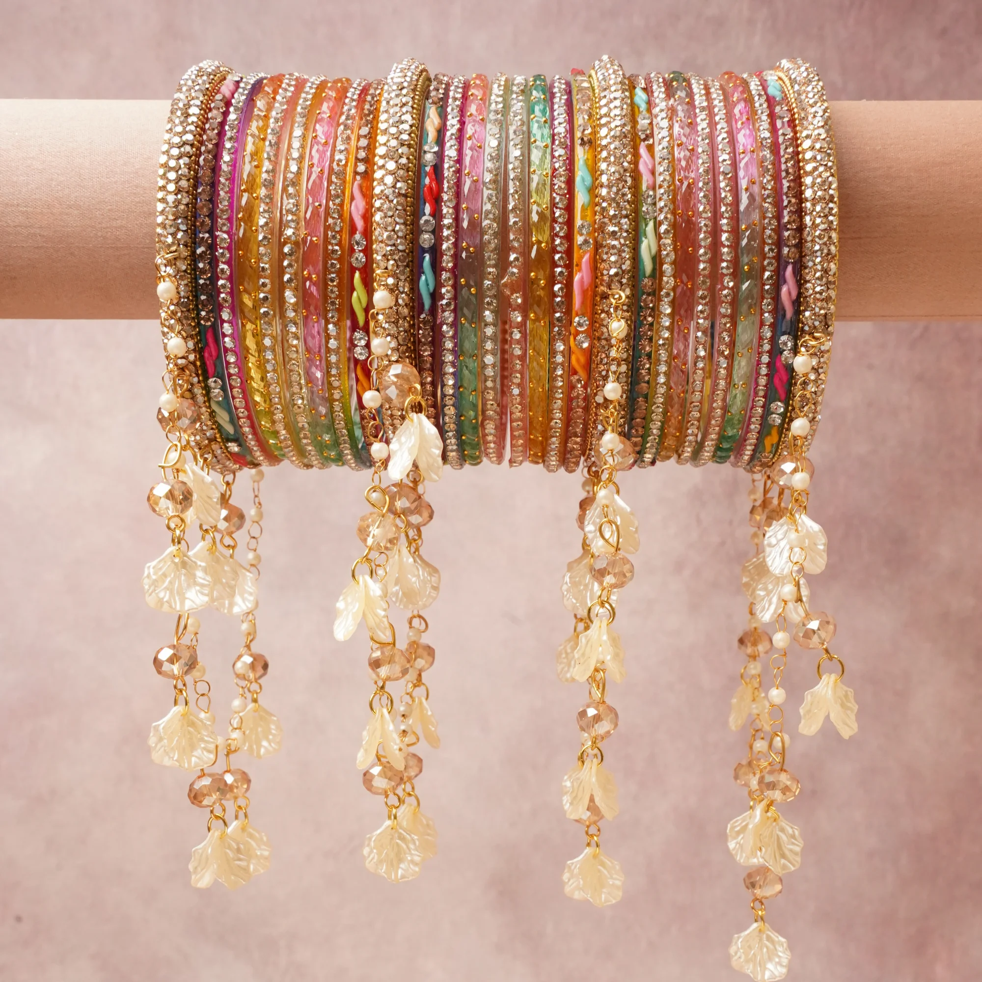 A commanding Gold anchors this beautiful set, enriched with accents of White Pearl, Fuchsia Pink, Emerald Green, Lemon Yellow, Sky Blue, Crimson Red, Tangerine Orange, Lavender Purple, Teal that add depth and dimension.

Featuring a striking composition of Gold-toned Metal Alloy, Glass/Resin, Crystals, Faux Pearls, Acrylic/Resin, this set carries intricate craftsmanship and strong presence. Grand in form, it is created for moments that deserve to be marked.